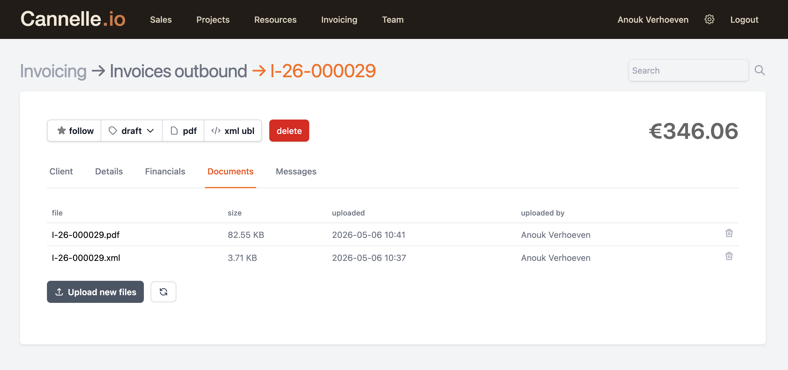 The invoice Documents tab showing both the PDF and XML file saved as attachments