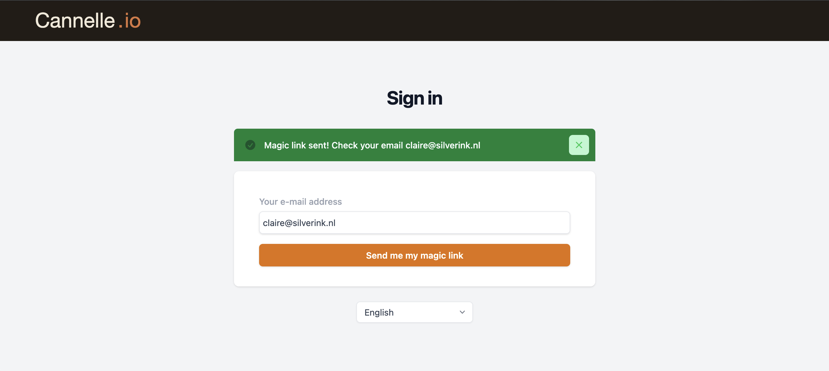 The Cannelle login page after submitting an email, showing a green success notification confirming the magic link was sent