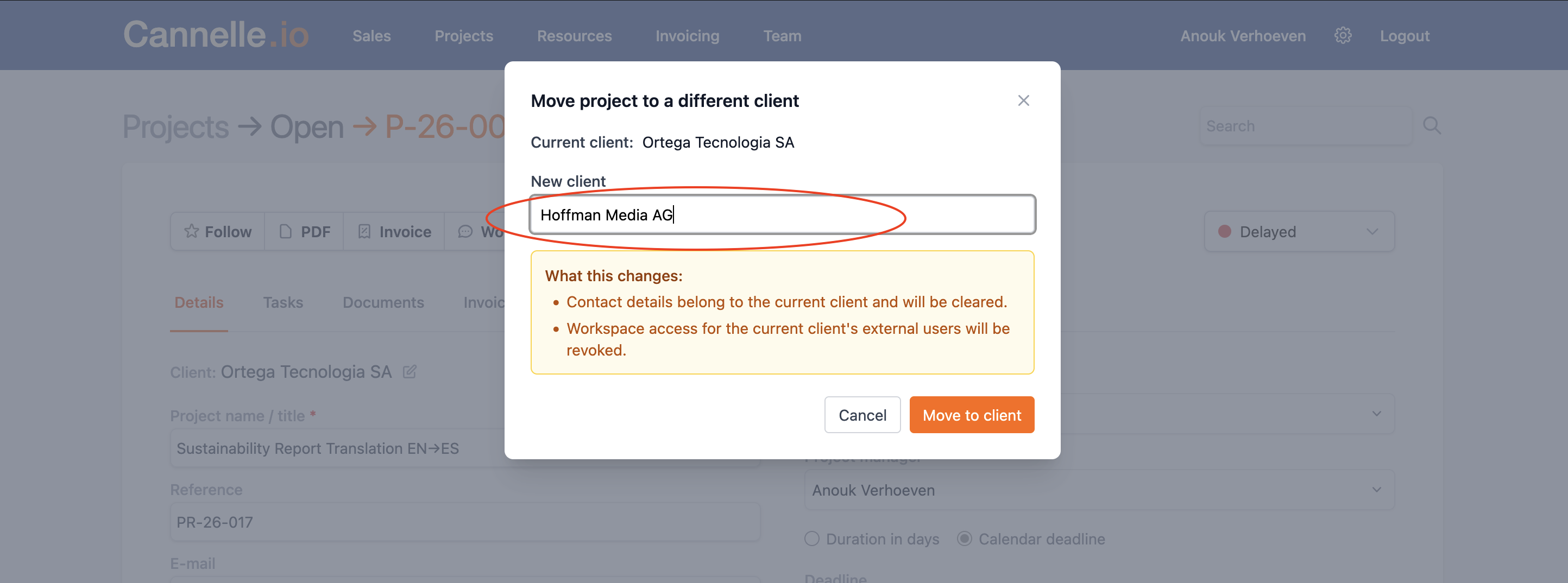 The confirmation step listing what the move changes, with Cancel and Move to client buttons