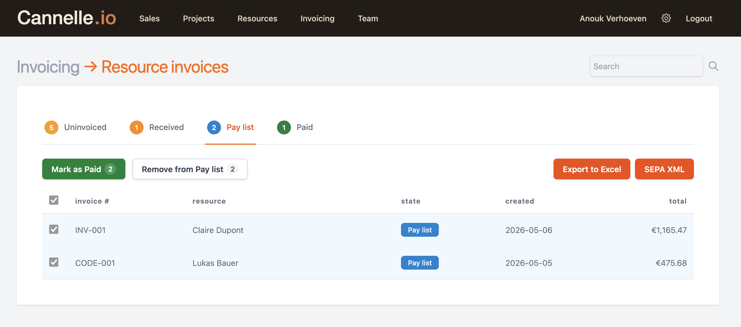 The Pay list tab with export options and two approved invoices